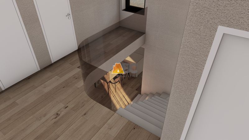 Belső tér lépcsővel, fehér ajtókkal és fa dekorációjú padlóval.