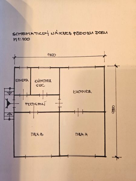 Családi ház vázlatos elrendezése szobával, konyhával, fürdőszobával és kamrával.